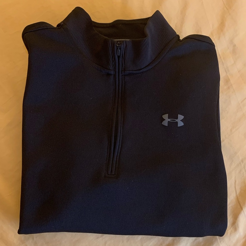 Under Armour Storm 1/4 Zip long sleeve black golf pullover. Excellent condition